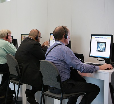 doctors listening to virtual meeting